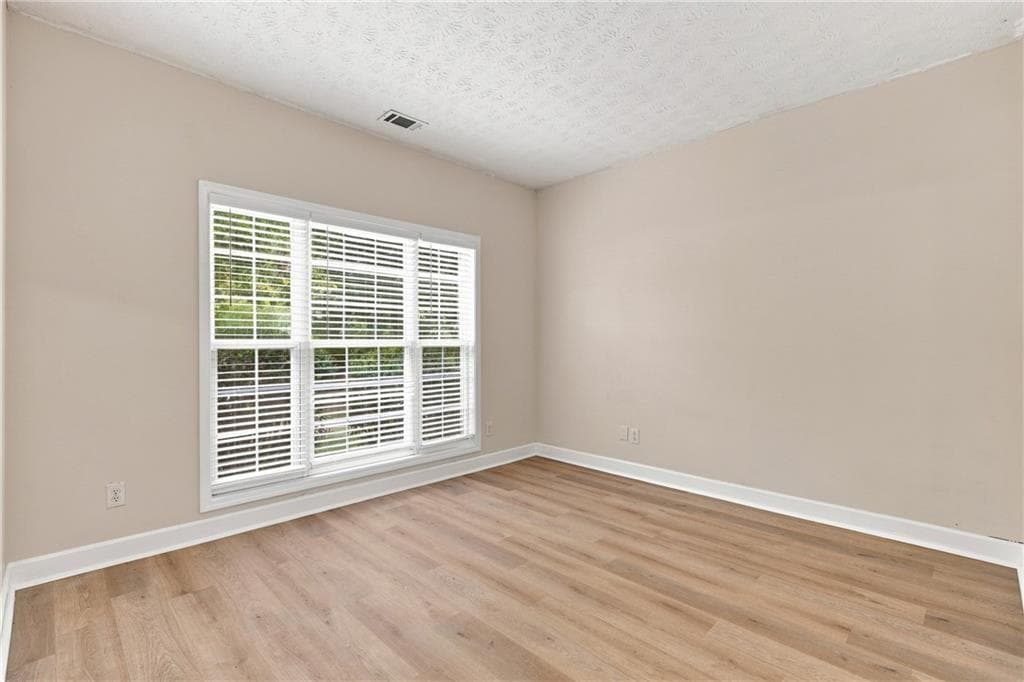 4 bedroom, 3 bathroom, 2,166 sq ft single family residence for sale at 6356 Wilmington Way, Flowery Branch, GA 30542 — photo 8