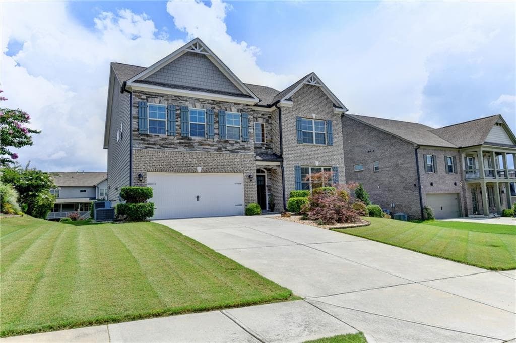 5 bedroom, 4 bathroom, 3,342 sq ft single family residence for sale at 4177 Heisenberg Lane, Suwanee, GA 30024 — photo 3