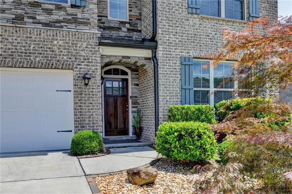 5 bedroom, 4 bathroom, 3,342 sq ft single family residence for sale at 4177 Heisenberg Lane, Suwanee, GA 30024 — photo 4