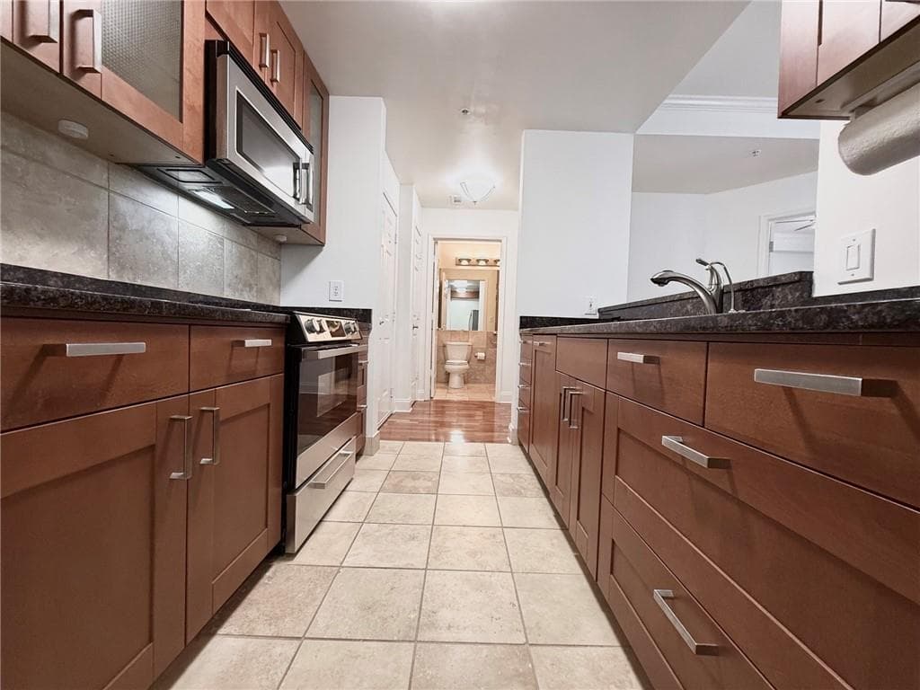 1 bedroom, 1 bathroom, 730 sq ft condominium for sale at 1075 Peachtree Walk A206, Atlanta, GA 30309 — photo 7