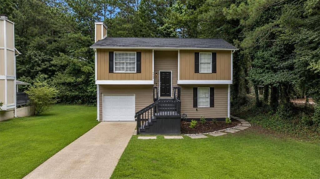 3 bedroom, 2 bathroom, 774 sq ft single family residence for sale at 5300 Forest Downs Lane, Atlanta, GA 30349 — photo 1 of 24
