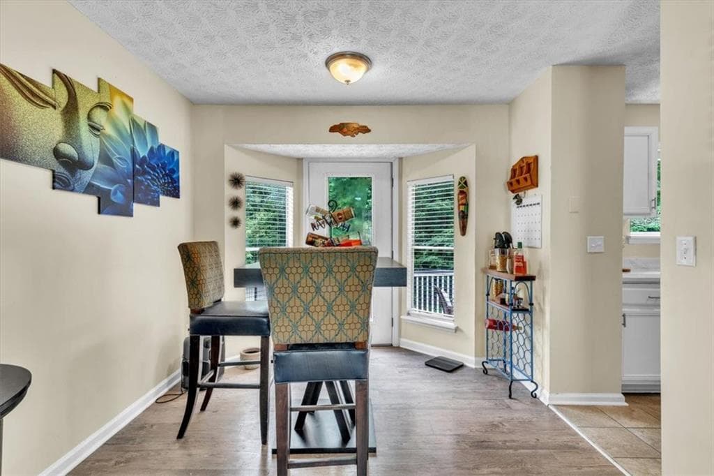 3 bedroom, 2 bathroom, 774 sq ft single family residence for sale at 5300 Forest Downs Lane, Atlanta, GA 30349 — photo 6