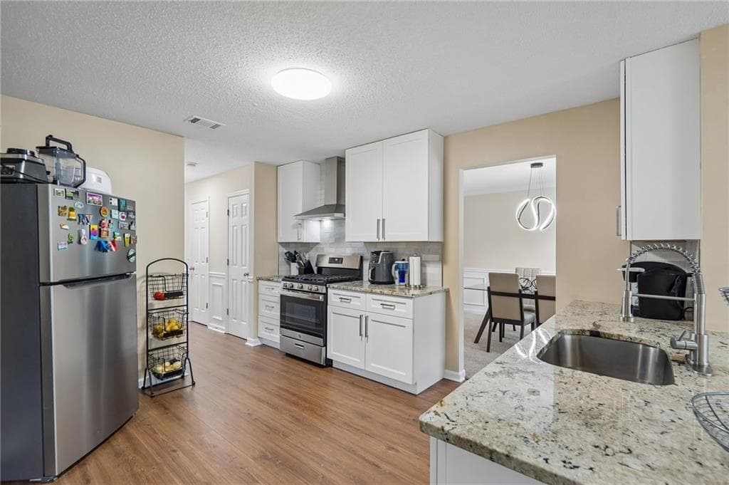 4 bedroom, 3 bathroom, 2,631 sq ft single family residence for sale at 6612 Pamplona Place, Atlanta, GA 30349 — photo 8