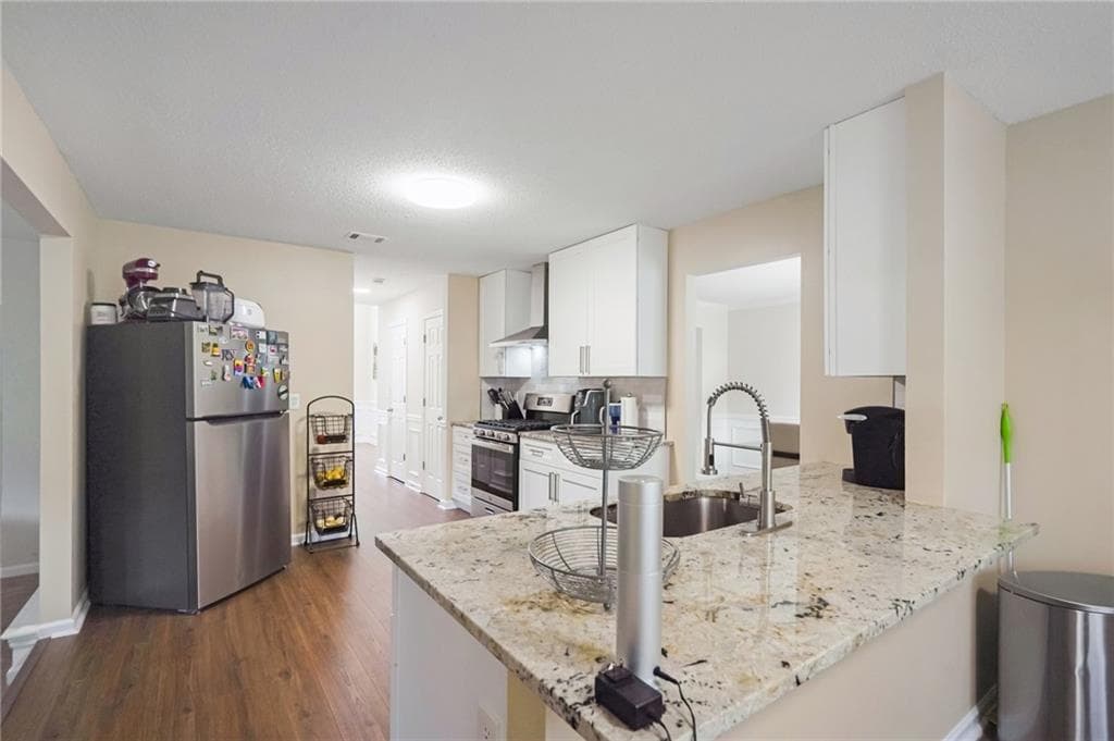 4 bedroom, 3 bathroom, 2,631 sq ft single family residence for sale at 6612 Pamplona Place, Atlanta, GA 30349 — photo 10