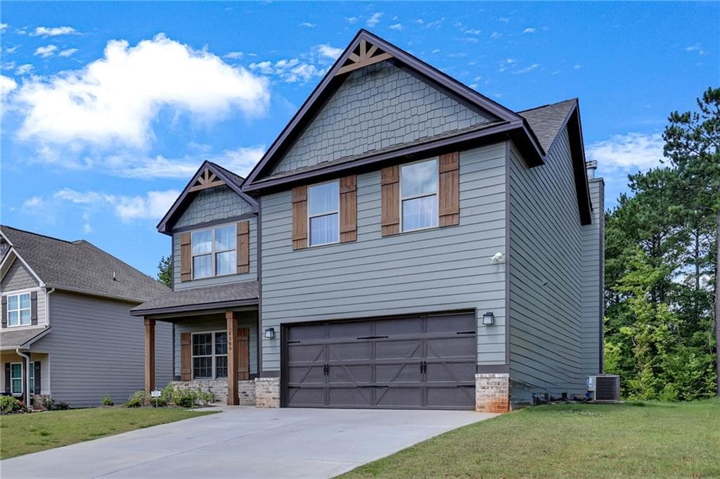 4 bedroom, 3 bathroom, 1,963 sq ft single family residence for sale at 4589 Capulet Court, Forsyth, GA 31029 — photo 2