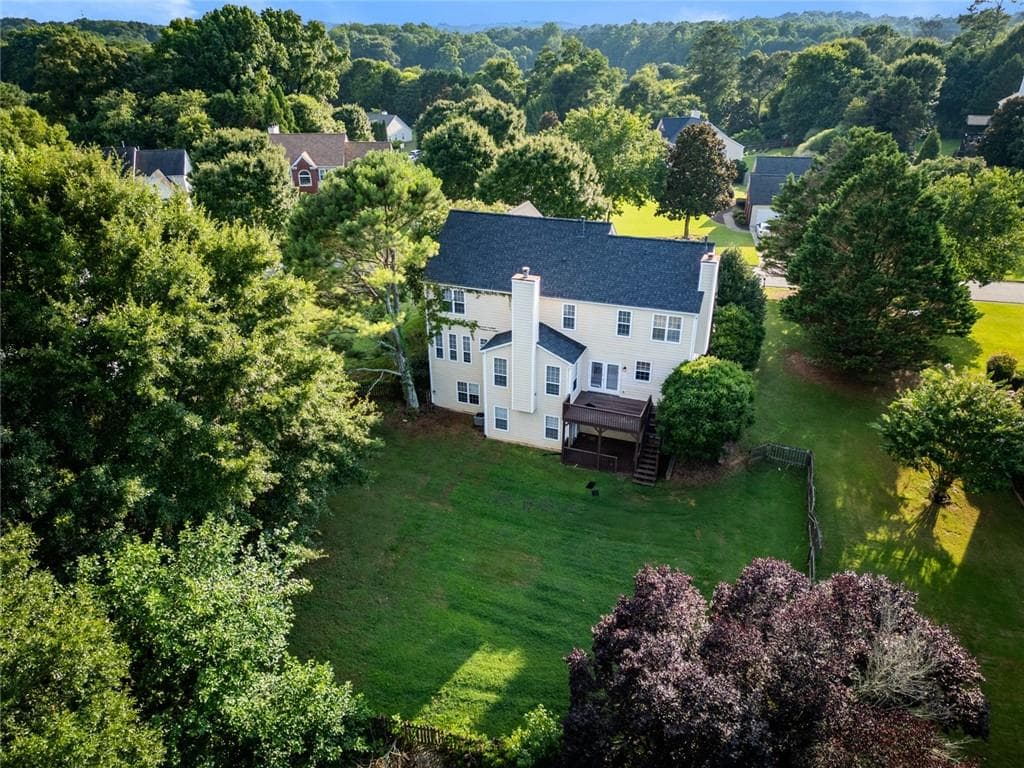6 bedroom, 4 bathroom, 4,244 sq ft single family residence for sale at 7110 Dressage Way, Cumming, GA 30040 — photo 3