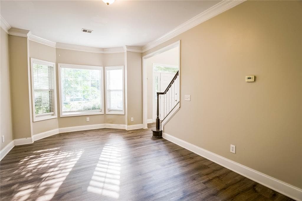6 bedroom, 4 bathroom, 4,244 sq ft single family residence for sale at 7110 Dressage Way, Cumming, GA 30040 — photo 6