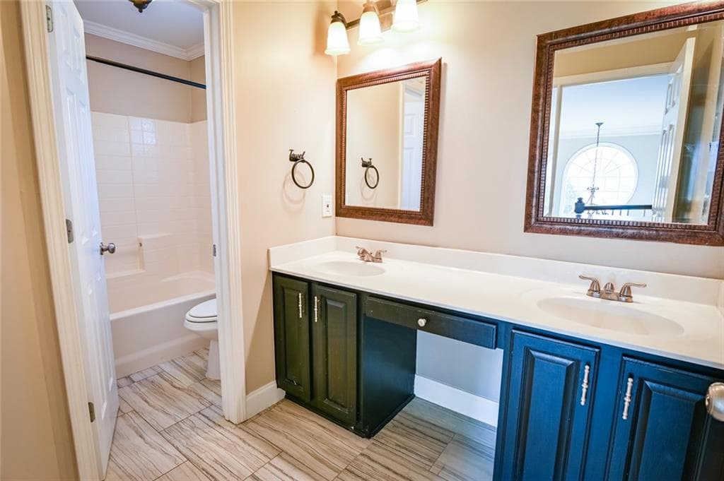 6 bedroom, 4 bathroom, 4,244 sq ft single family residence for sale at 7110 Dressage Way, Cumming, GA 30040 — photo 8
