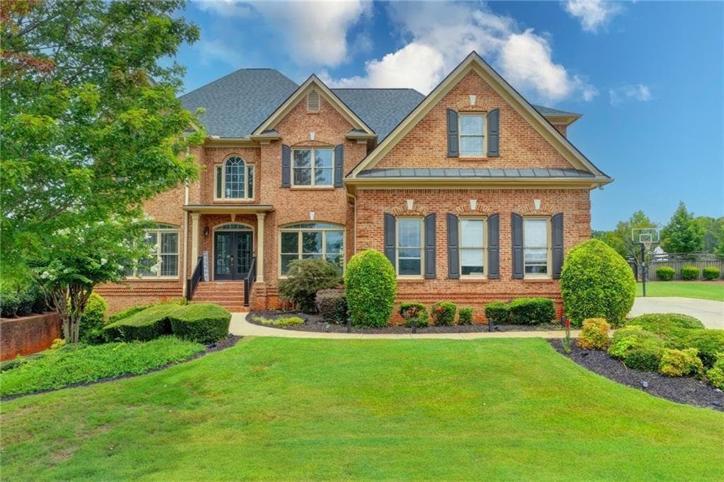 6 bedroom, 6 bathroom, 6,772 sq ft single family residence for sale at 2241 Hunters Green Drive, Lawrenceville, GA 30043