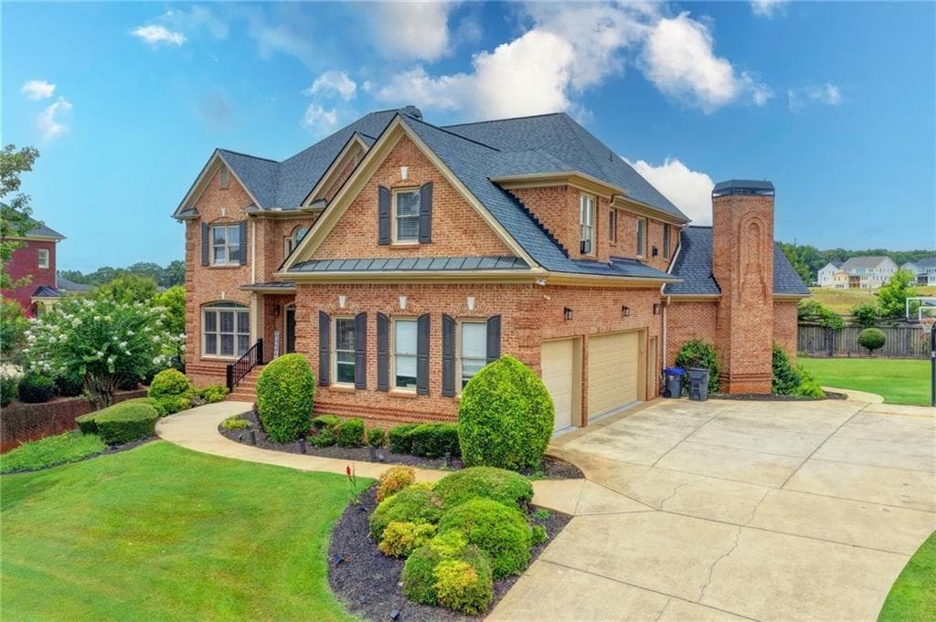6 bedroom, 6 bathroom, 6,772 sq ft single family residence for sale at 2241 Hunters Green Drive, Lawrenceville, GA 30043 — photo 2