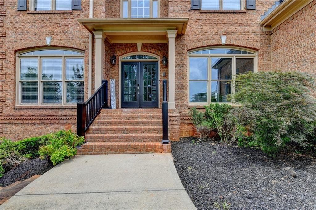 6 bedroom, 6 bathroom, 6,772 sq ft single family residence for sale at 2241 Hunters Green Drive, Lawrenceville, GA 30043 — photo 3