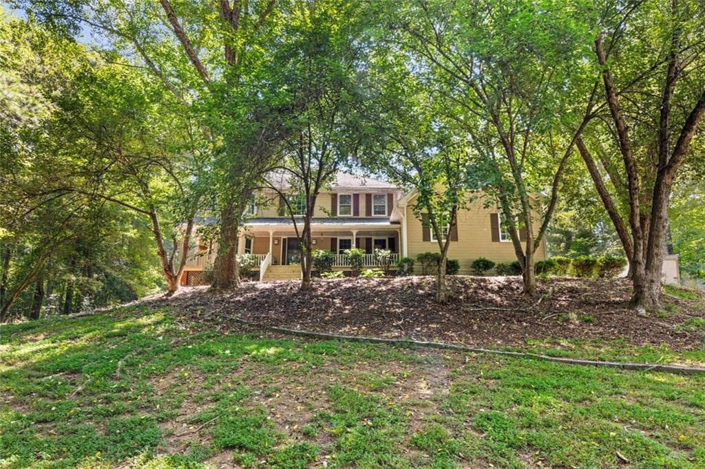 4 bedroom, 3 bathroom, 3,864 sq ft single family residence for sale at 4162 Riverdale Drive, Snellville, GA 30039 — photo 2