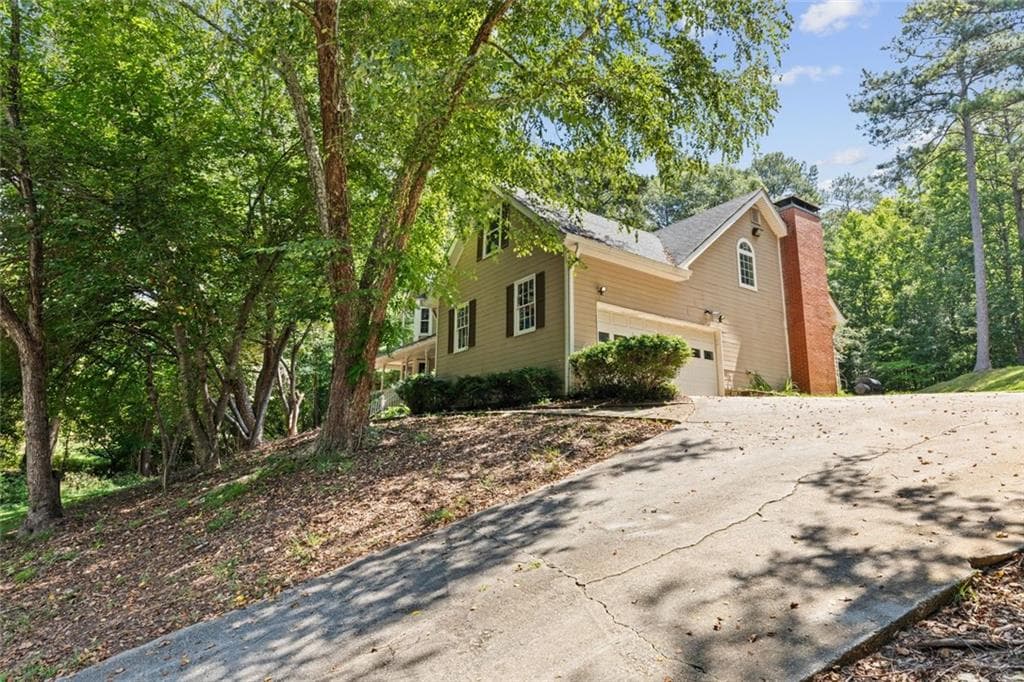 4 bedroom, 3 bathroom, 3,864 sq ft single family residence for sale at 4162 Riverdale Drive, Snellville, GA 30039 — photo 3