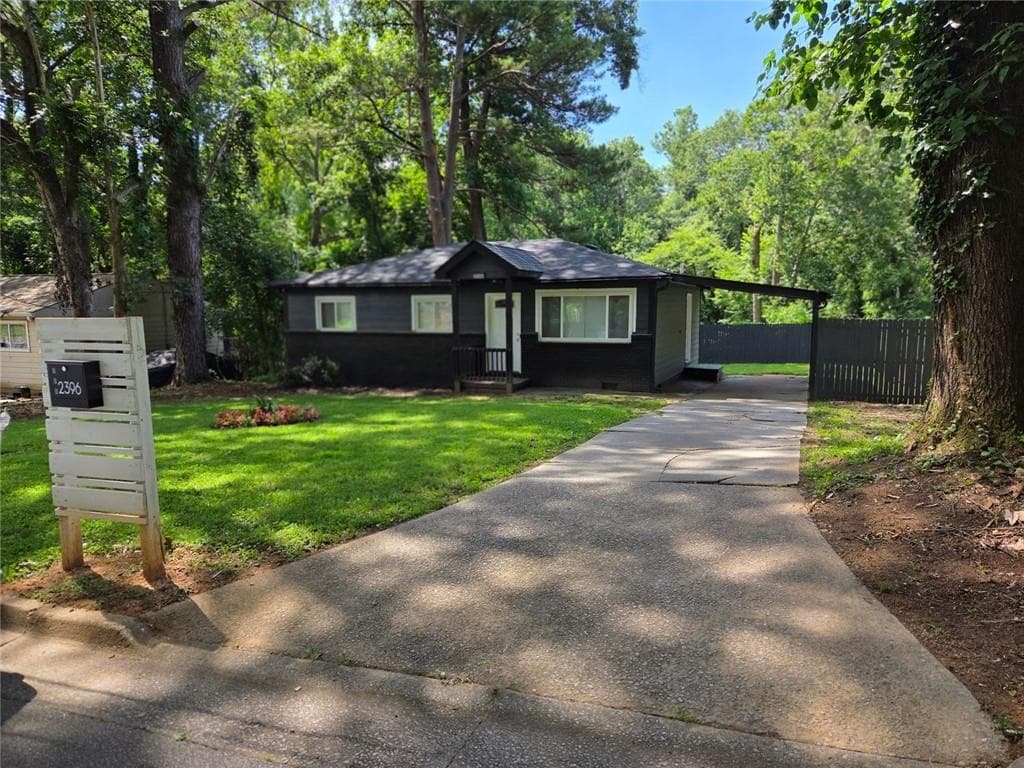 3 bedroom, 1 bathroom, 900 sq ft single family residence for sale at 2396 Clarissa Drive, Atlanta, GA 30318 — photo 1 of 18