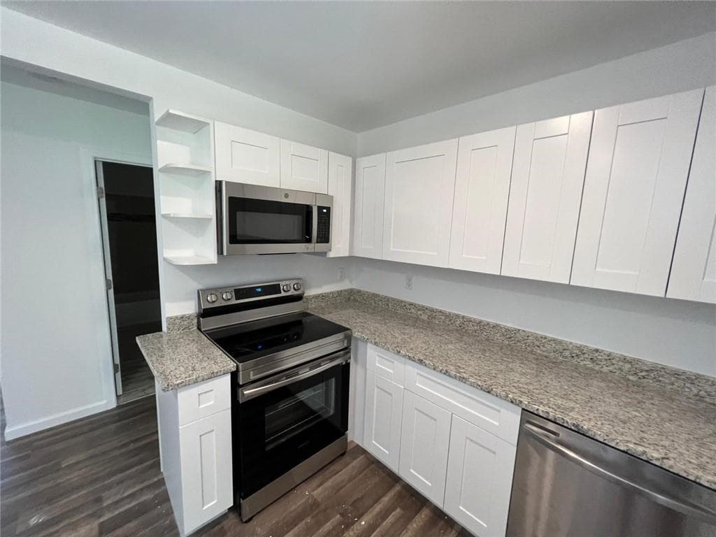 3 bedroom, 2 bathroom, 1,061 sq ft single family residence for sale at 6066 Creekford Drive, Lithonia, GA 30058 — photo 6