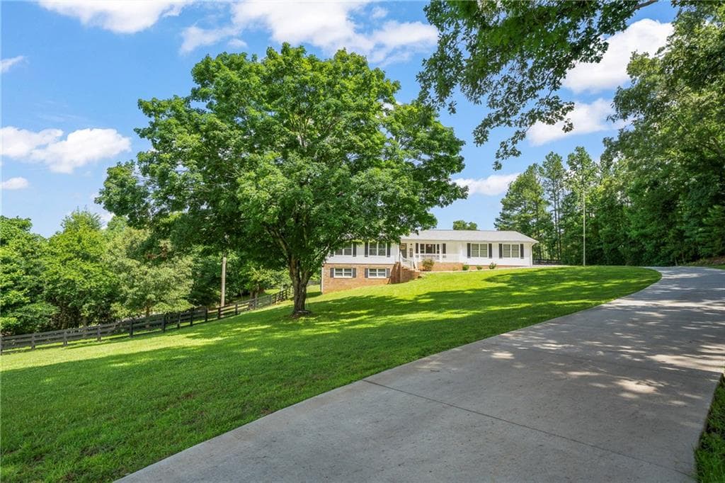 5 bedroom, 3 bathroom, 4,242 sq ft single family residence for sale at 851 Lacy Road, Canton, GA 30115