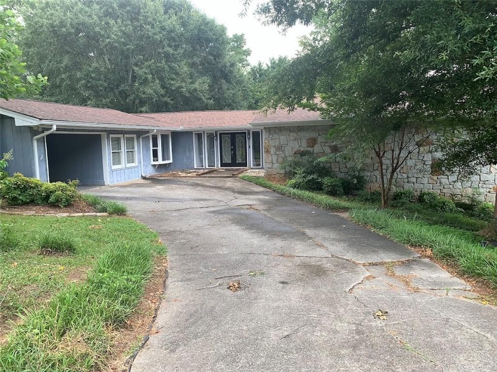 4 bedroom, 3 bathroom, 3,496 sq ft single family residence sold at 402 Emily Drive, Lilburn, GA 30047