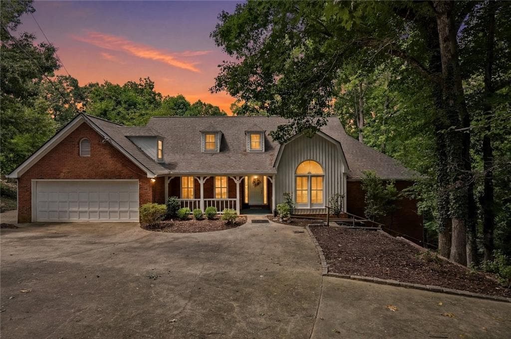 6 bedroom, 5 bathroom, 6,890 sq ft single family residence for sale at 6170 Six Mile Cove Road, Cumming, GA 30041