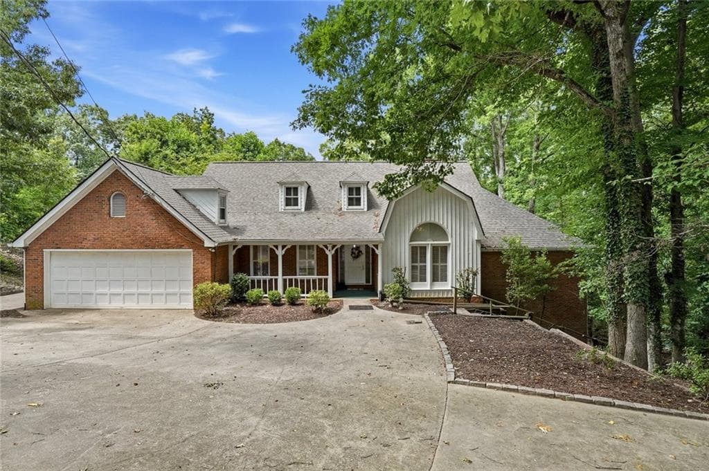 6 bedroom, 5 bathroom, 6,890 sq ft single family residence for sale at 6170 Six Mile Cove Road, Cumming, GA 30041 — photo 2