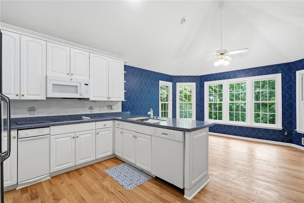 6 bedroom, 5 bathroom, 6,890 sq ft single family residence for sale at 6170 Six Mile Cove Road, Cumming, GA 30041 — photo 6