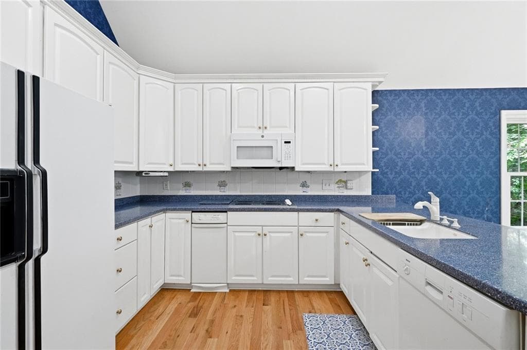 6 bedroom, 5 bathroom, 6,890 sq ft single family residence for sale at 6170 Six Mile Cove Road, Cumming, GA 30041 — photo 7