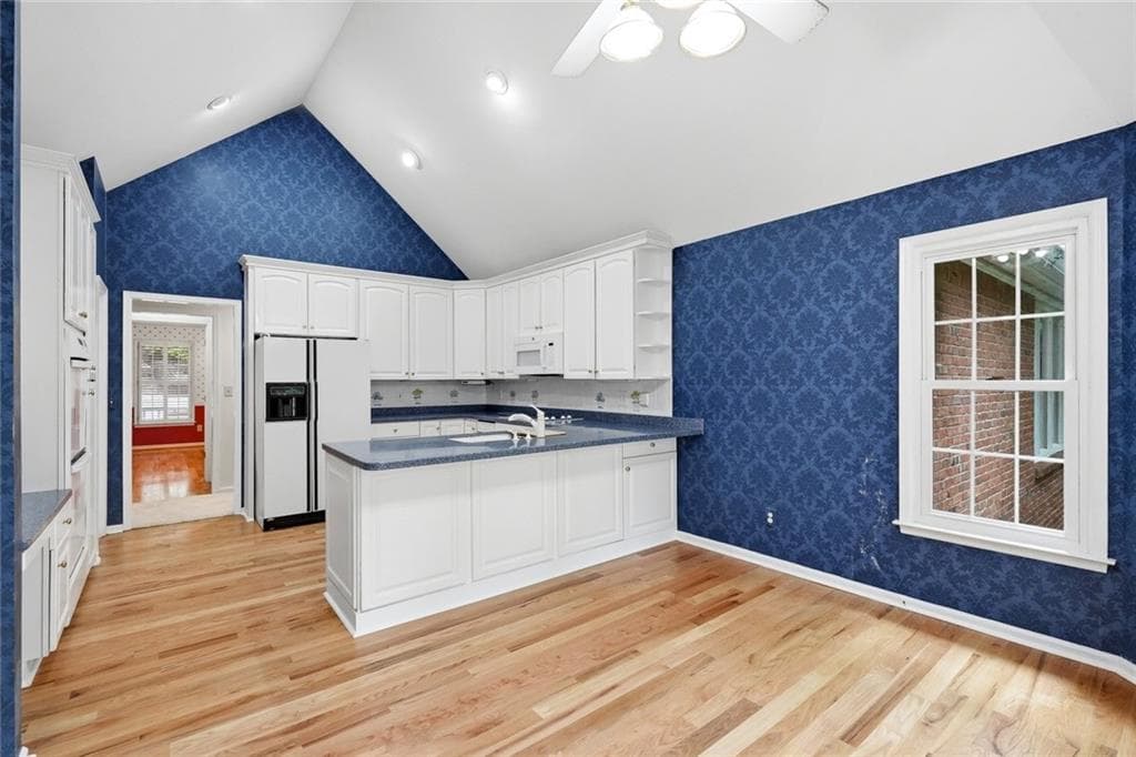 6 bedroom, 5 bathroom, 6,890 sq ft single family residence for sale at 6170 Six Mile Cove Road, Cumming, GA 30041 — photo 8