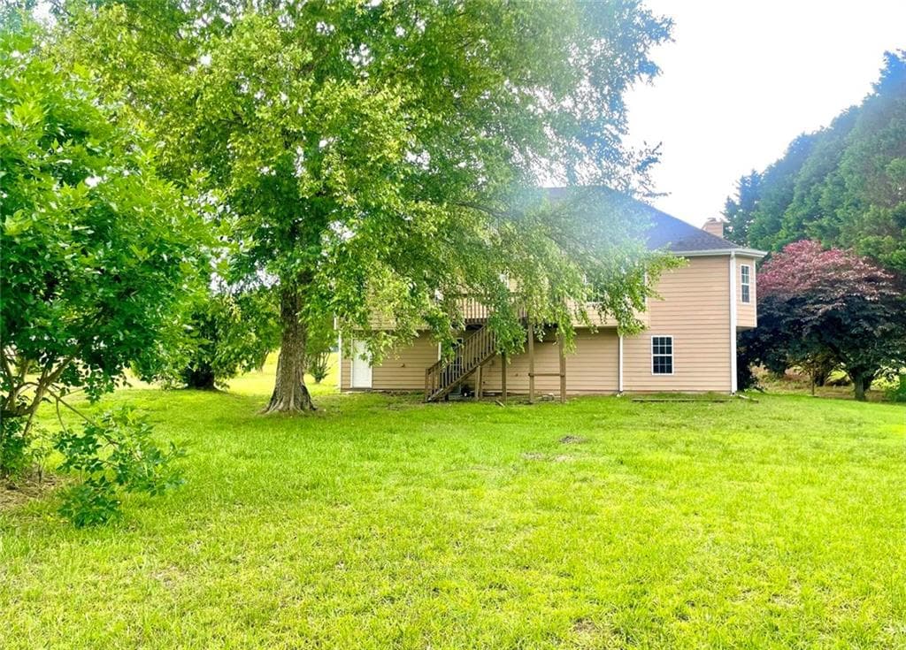 3 bedroom, 2 bathroom, 2,340 sq ft single family residence for sale at 3095 Oak Grove Road, Loganville, GA 30052 — photo 2