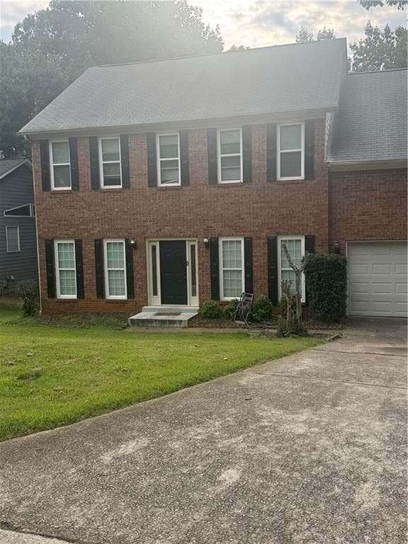 4 bedroom, 3 bathroom, 2,056 sq ft single family residence for sale at 720 Paris Drive, Lawrenceville, GA 30043 — photo 2
