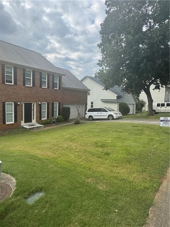 4 bedroom, 3 bathroom, 2,056 sq ft single family residence for sale at 720 Paris Drive, Lawrenceville, GA 30043 — photo 4