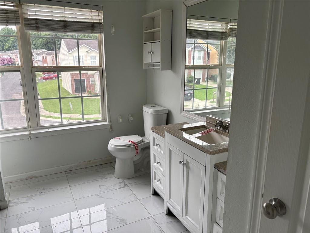 3 bedroom, 3 bathroom, 1,680 sq ft single family residence for sale at 5074 Windsor Forrest Lane, Atlanta, GA 30349 — photo 9