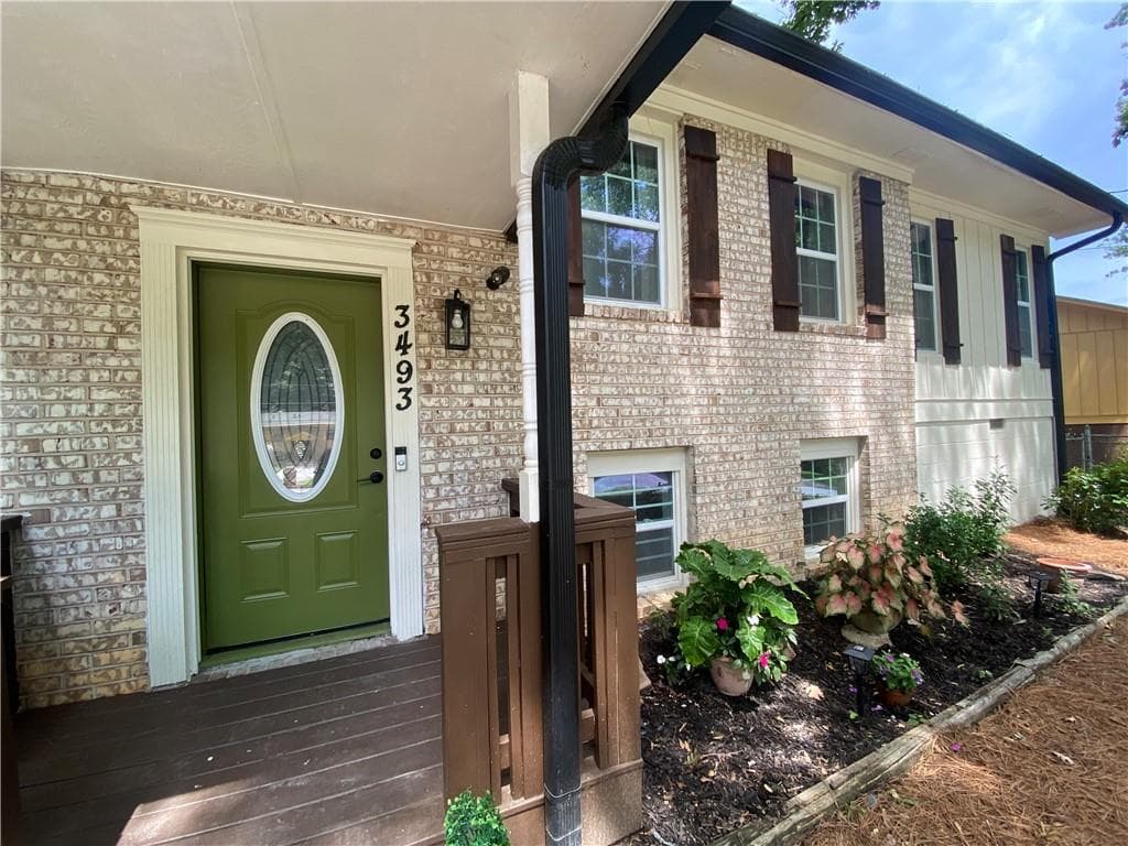 4 bedroom, 3 bathroom, 2,440 sq ft single family residence for sale at 3493 Mark Place, Atlanta, GA 30331 — photo 4