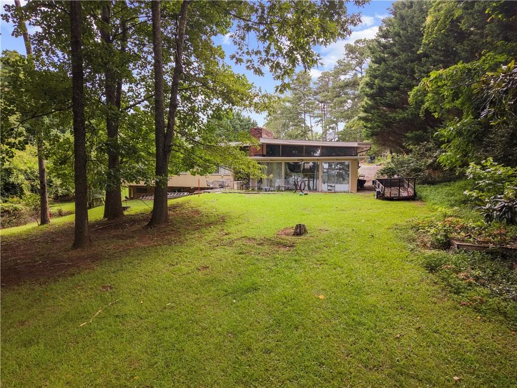 3 bedroom, 2 bathroom single family residence for sale at 7940 Lanier Drive, Cumming, GA 30041 — photo 4
