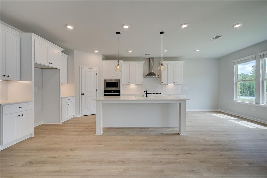 5 bedroom, 4 bathroom, 3,625 sq ft single family residence for sale at 1112 Brinshire Way, Locust Grove, GA 30248 — photo 9