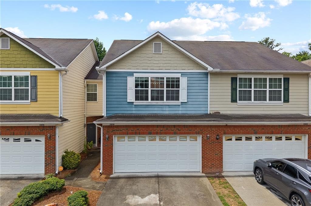 3 bedroom, 3 bathroom, 1,724 sq ft townhouse for rent at 1058 Treymont Lane, Lawrenceville, GA 30045 for $2,000 a month — photo 1 of 41