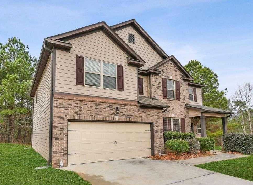 4 bedroom, 3 bathroom, 3,968 sq ft single family residence under contract at 5615 Wisbech Way, Atlanta, GA 30349 — photo 2