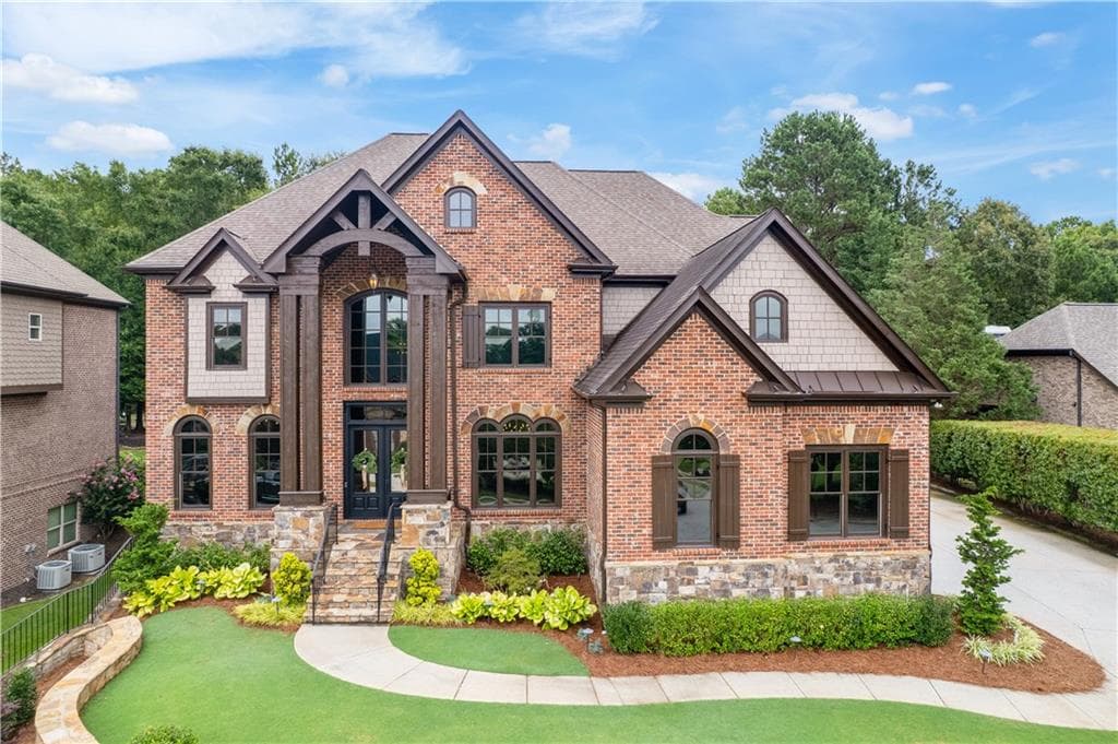 6 bedroom, 6 bathroom, 6,474 sq ft single family residence sold at 2003 Skybrooke Lane, Hoschton, GA 30548