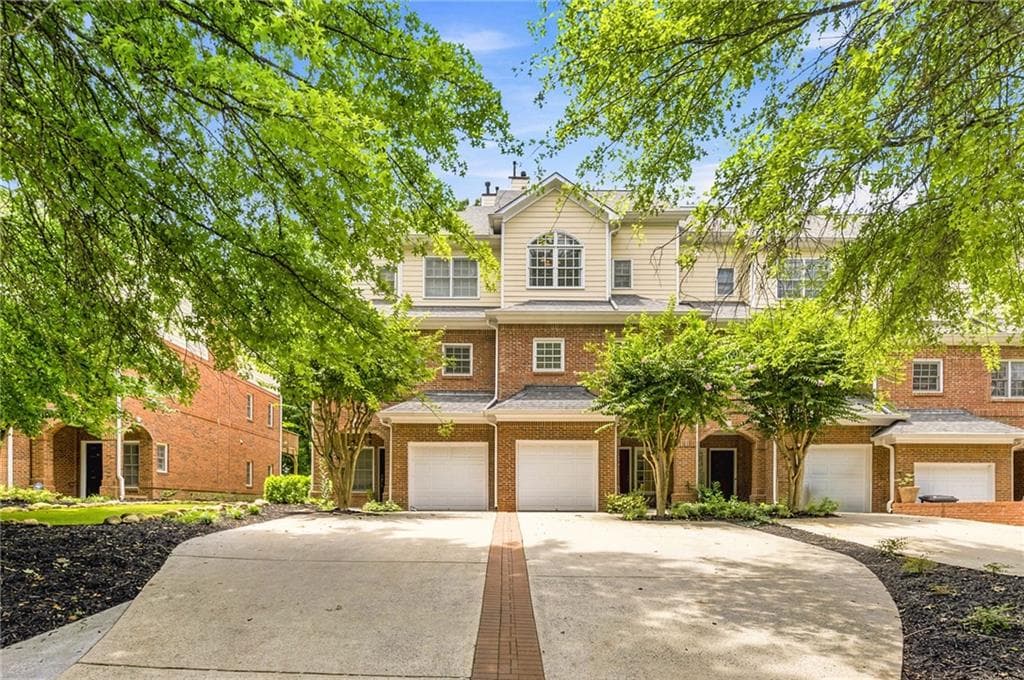 3 bedroom, 4 bathroom, 2,301 sq ft townhouse for sale at 1200 Wing Street 12, Atlanta, GA 30350