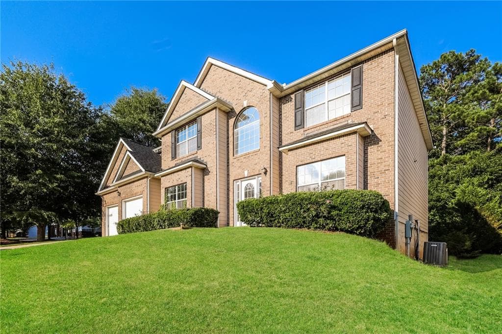 5 bedroom, 3 bathroom, 3,584 sq ft single family residence for sale at 2722 Elkmont Ridge, Atlanta, GA 30331 — photo 3