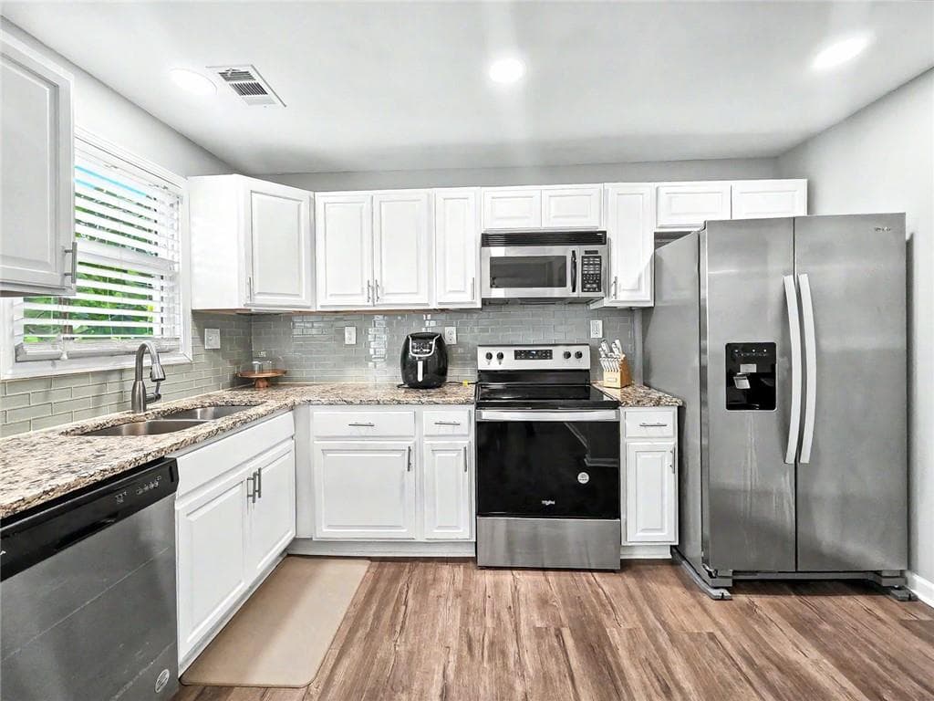 3 bedroom, 2 bathroom, 1,274 sq ft single family residence for sale at 1530 Columbia Drive, Decatur, GA 30032 — photo 10