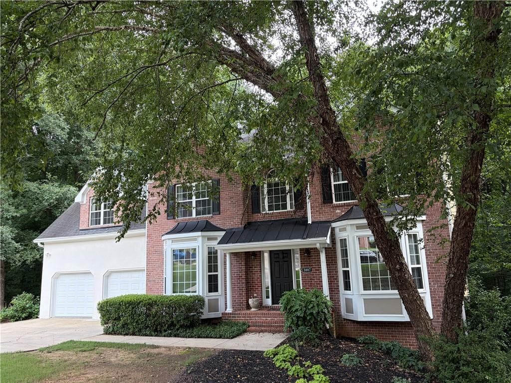 4 bedroom, 3 bathroom, 3,220 sq ft single family residence for sale at 3887 Old Savannah Court, Douglasville, GA 30135 — photo 2