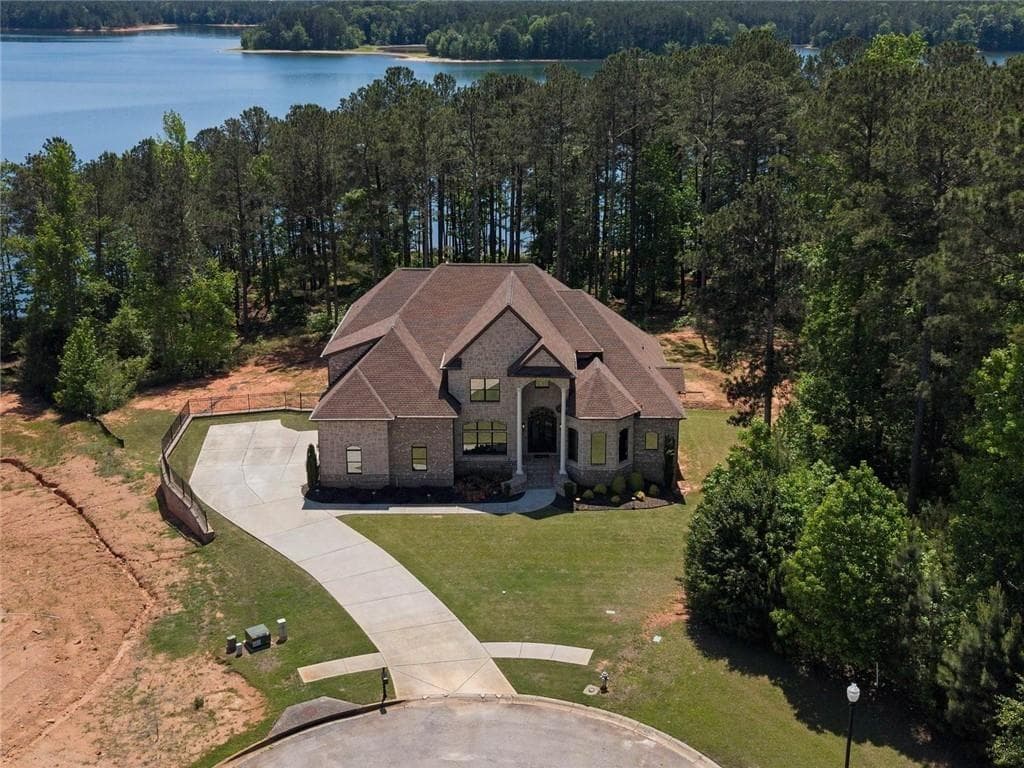 8 bedroom, 9 bathroom, 7,239 sq ft single family residence for sale at 1804 Lake Pointe Circle, Locust Grove, GA 30248