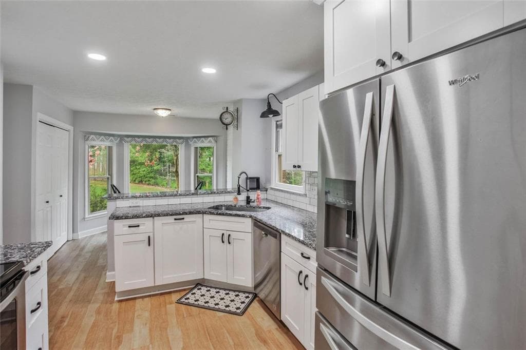 2 bedroom, 3 bathroom, 1,696 sq ft condominium for sale at 6420 Windsor Trace Drive 6420, Peachtree Corners, GA 30092 — photo 4
