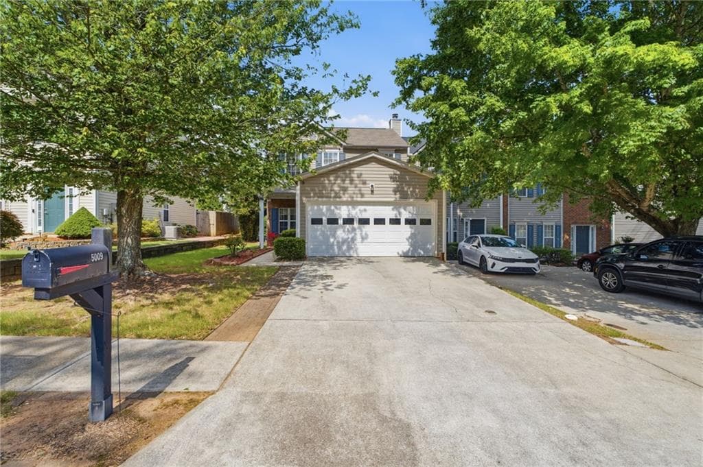 3 bedroom, 3 bathroom, 1,256 sq ft townhouse for sale at 5009 Timber Hills Drive, Oakwood, GA 30566 — photo 1 of 31