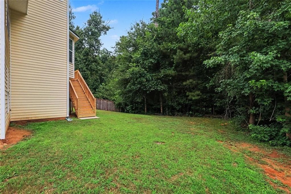 4 bedroom, 3 bathroom, 2,938 sq ft single family residence for sale at 3747 Valley Bluff Lane, Snellville, GA 30039 — photo 6