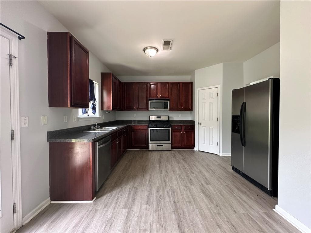 5 bedroom, 3 bathroom, 2,696 sq ft single family residence for rent at 1335 Rocky Shoals Lane, Suwanee, GA 30024 for $2,700 a month — photo 9
