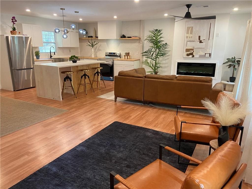 4 bedroom, 3 bathroom, 2,440 sq ft single family residence for sale at 3493 Mark Place, Atlanta, GA 30331 — photo 6