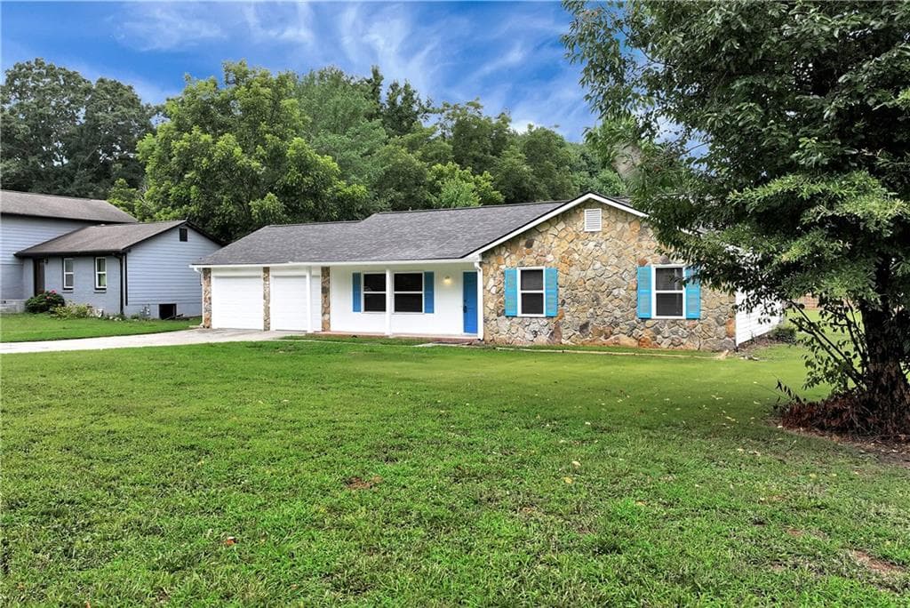 3 bedroom, 2 bathroom, 1,396 sq ft single family residence for sale at 649 Oakland Way, Lawrenceville, GA 30044 — photo 2