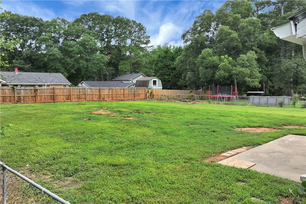 3 bedroom, 2 bathroom, 1,396 sq ft single family residence for sale at 649 Oakland Way, Lawrenceville, GA 30044 — photo 5