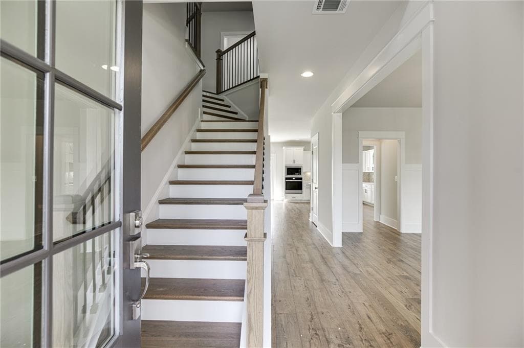 4 bedroom, 4 bathroom, 2,562 sq ft single family residence for sale at 1803 Piney Bend Drive, Buford, GA 30518 — photo 4