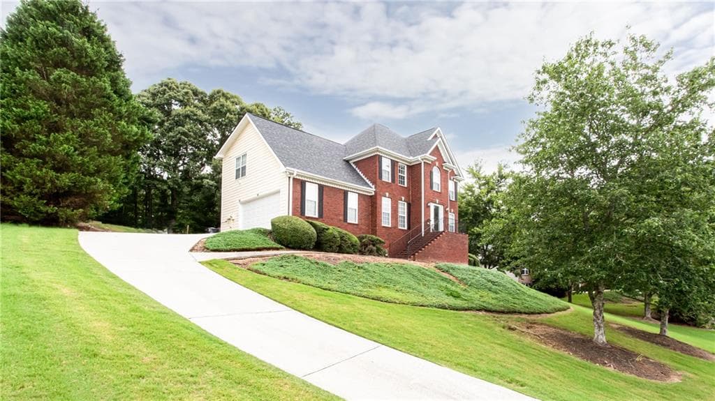 4 bedroom, 4 bathroom, 2,313 sq ft single family residence for sale at 2436 Sky Valley Drive, Dacula, GA 30019 — photo 1 of 20